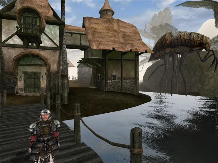 Первая локация игры, деревня Сейданин, с местными иловыми страйдерами на заднем плане.